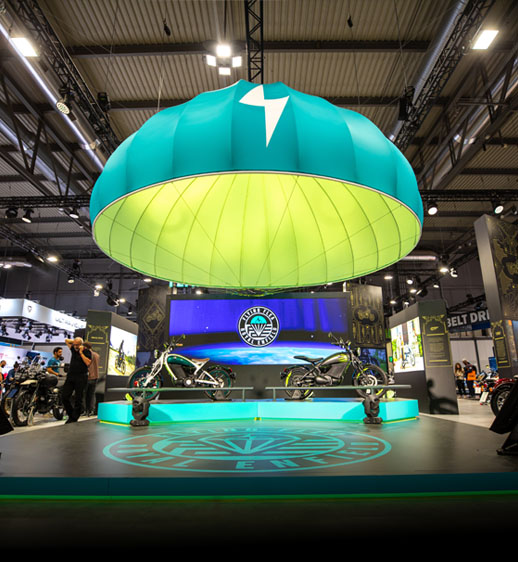 Electric motorcycles displayed at a motorcycle show