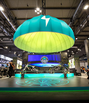 Electric motorcycles displayed at a motorcycle show